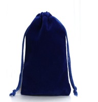 Petite pochette en velours bleu marine avec cordon de serrage pour le rangement de bijoux