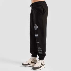 Pantalon de jogging GAI Pulse pour homme 100 % coton, noir, en molleton bouclette, coupe ample, style sportif, taille basse, tailles XL et 6XL - Product Image 1