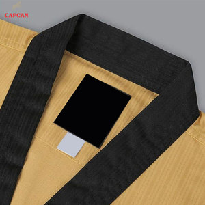 ชุดยูโด/เทควันโดแขนยาวผ้าฝ้ายขายส่ง OEM ราคาพิเศษ พร้อมโลโก้ด้านหน้าปรับแต่งได้ - Product Image 4