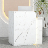 Bureau d'accueil moderne de luxe couleur personnalisée, surface solide, décoration lumineuse LED, garantie 10 ans pour hôtel, salon, clinique dentaire
