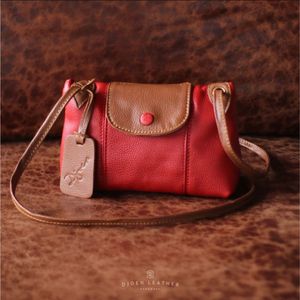 Sac Hobo à carreaux et rayures tissés à la main Solstice avec bandoulière en cuir véritable Pochette à bandoulière artisanale d'Indonésie - Product Image 1