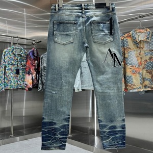 กางเกงยีนส์ผู้ชายเอวสูงรัดรูปเอวกลางกางเกงลำลองแนวสตรีทแบบขาดสติกเกอร์ผ้ายีนส์แบบห้อยผ้าคอตตอนซักสีฟ้าสำหรับฤดูใบไม้ผลิ - Product Image 4