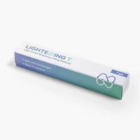 Unité de distribution de matériau de pâte pour l'application de base en couches dans les préparations dentaires avec activation par la lumière d'Inde