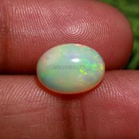 Pierres précieuses calibrées d'opale naturelle 12x9mm cabochon d'opale arc-en-ciel pierre précieuse d'opale éthiopienne pour la fabrication de bijoux et de cadeaux