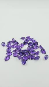 พลอยแอมะทิสต์ธรรมชาติคุณภาพสูง รูปทรงลูกแพร์ขนาด 9x11 มม. เจียระไนเหลี่ยม แสงเงางาม สีสวยงาม รับรองโดยผู้เชี่ยวชาญ สามารถปรับแต่งได้ - Product Image 2
