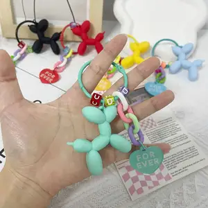 Chaveiro de PVC para cachorro, pingente de coração e moda promocional, acessório com cordão para fones de ouvido, chaveiro de cachorro DIY em cores doces