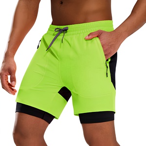 Shorts de sport pour homme, vert uni, séchage rapide, avec poches, cordon de serrage à la taille, longueur mi-cuisse, en spandex et polyester tricoté - Product Image 1