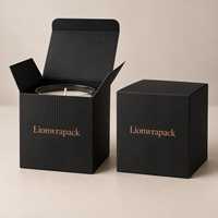Boîte cadeau pour une seule bougie Lionwrapack personnalisée en terre cuite avec couvercle et base en relief soleil couchant, logo noir