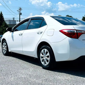 Toyota Corolla Hybride Limited AWD 2014 d'occasion en excellent état, 4 portes, intérieur foncé, conduite à droite/gauche, livraison rapide et vente disponible - Product Image 1