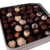Truffes au chocolat massif légendaires du Vietnam avec ganache à la liqueur de mangue, saveur tropicale exotique, élégante boîte en étain, emballage cadeau