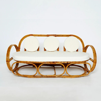 Canapé vintage en rotin avec design circulaire, meubles bohèmes pour le salon
