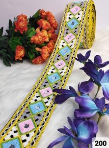 Hecho a medida en tela base blanca y cordones bordados diseñados con chakra multicolor para vestidos de mujer y para reventa. - Product Image 6