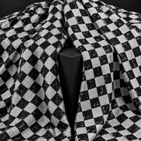 Tissu en maille à sequins géométriques noir et blanc avec motif à carreaux pour robes et décorations d'événements (vente en gros)