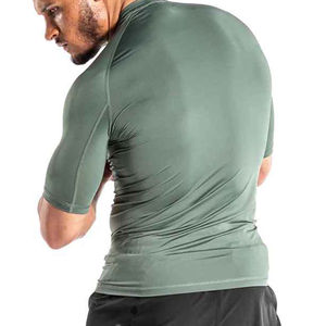 El mejor 2025 nuevo OEM más Popular Rash Guard para hombres Elegante camisa de compresión transpirable para gimnasio Diseño más fabricado - Product Image 2