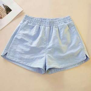 Short de tennis de table à séchage rapide pour femme Logo taille avant plissé manches courtes nom de l'équipe OEM pour les sports d'entraînement de compétition - Product Image 1