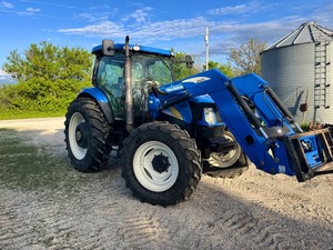 PROVEEDOR VERIFICADO de Tractor Usado New Holland T6070 con Cargador New Holland 840T con Cucharón de 8 Pies y Garra de 4 Dientes - Product Image 4