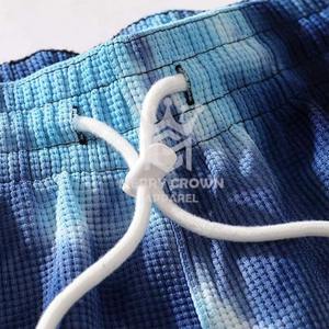 กางเกงขาสั้นผ้าฝ้าย100% สำหรับผู้ชายสีทึบเป็นมิตรกับสิ่งแวดล้อม - Product Image 2