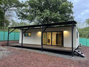 บ้านคอนเทนเนอร์สำเร็จรูปสมัยใหม่พร้อมระเบียงมีหลังคาและพื้นไม้สำหรับอยู่อาศัย + จัดส่งฟรี - Product Image 6