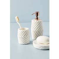 Venta caliente tendencia nuevo conjunto de dispensador de jabón de mármol de textura negra con soporte de cepillo de bandeja y jabonera decoración de baño elegante
