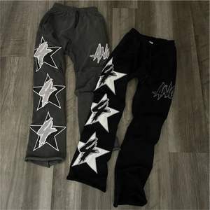 กางเกงวอร์มผ้าฟลีซสำหรับผู้ชายโอเวอร์ไซส์ผ้าฟลีซสำหรับผ้าพัฟพิมพ์ลายผ้าฝ้าย - Product Image 2