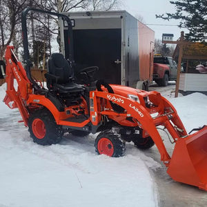 Tractor Compacto Kubota BX23S de 23 HP Diésel 4x4 con Cargador Frontal, Retroexcavadora y Cortadora de Césped - Product Image 1