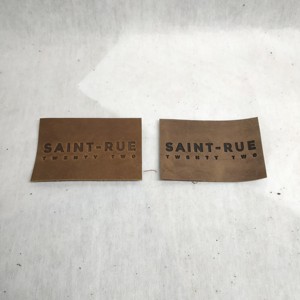 Precio barato personalizado respetuoso con el medio ambiente reciclado bolso de cuero genuino forro de ropa etiquetas de ropa placa de identificación Logo en relieve a granel - Product Image 2