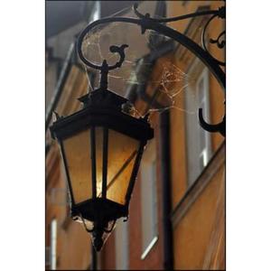 <b>Moroccan</b>-inspired iron <b>lantern</b> with stunning arabesque detailing and antique bronze finished for exotic ambiance - Product Image 5