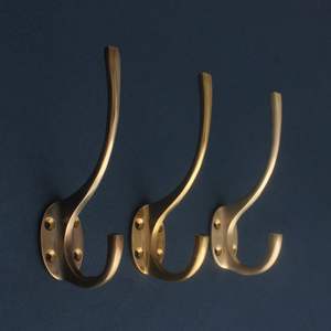 Artisan brass <b>wall</b> <b>hooks</b> reflect traditional metalworking techniques and refined design <b>for</b> heritage inspired interior decor - Product Image 6