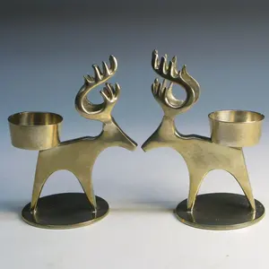 Candelabro en forma de ciervo con acabado dorado de alta calidad, decoración metálica hecha a mano para el hogar para Navidad, último diseño - Product Image 1