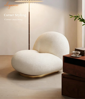 Fauteuil de détente moderne avec revêtement en tissu doux en peau de mouton et base en bois pour salon, chambre et appartement