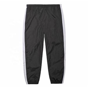Moda OEM logotipo personalizado hombres Casual Jogger conjunto de dos piezas de nailon poliéster hombre cargo rompevientos chándal para niños - Product Image 3