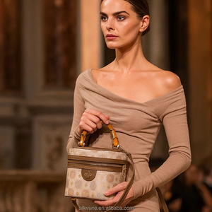 लक्जरी हस्तनिर्मित 100% रेशम यंजन कढ़ाई चमड़े. प्राच्य विरासत गोल हैंडबैग - Product Image 5