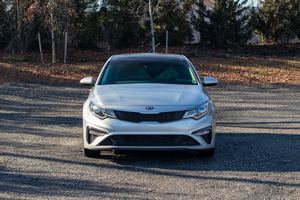 EXQUISITELY USED O-P-<b>T</b>-I-M-A 2019 LX FWD SILVER SEDAN COMBINED GAS MILEAGE 185 HORSEPOWER FRONT WHEEL <b>DRIVE</b> 6-SPEED DRIVETRAIN A - Product Image 4
