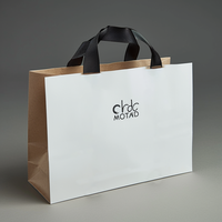 Sacs en papier d'emballage artisanal de luxe à la mode en gros sac en papier imprimé de logo personnalisé cadeau d'achat de vêtement bijoux vin