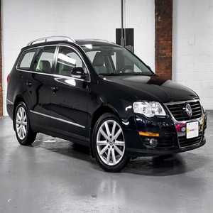 VOLKSWAGEN PASSAT KOMFORT WAGON 2010 D'OCCASION CÔTÉ GAUCHE/DROIT - Product Image 1