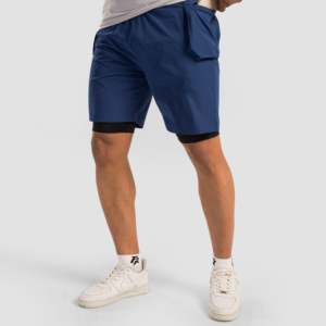 Pantalones Cortos Deportivos Aero Bermuda Azules Talla XS XXS Cómodos 100% Poliéster Algodón Cierre con Cremallera y Cordón con Logotipo Destacado - Product Image 1