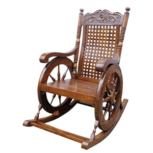 Mecedora de madera antigua con diseño tallado adornado, perfecta para la relajación interior clásica - Product Image 3