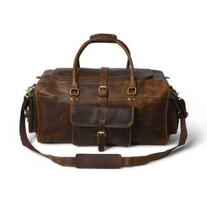 Spacious Leather Duffle Bag Travel Overnight Gym Bag With Zippered Compartments and Adjustable Shoulder <b>Strap</b> - Product Image 1