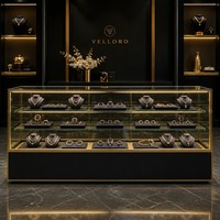 Comptoir de présentation de bijoux noir mat avec finition dorée, vitrine LED, étagères en verre pour magasin de détail