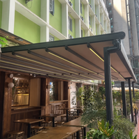 Wasserdichte Motorisierte Faltbare Pergola Verstärkter Aluminiumlegierungsrahmen Windbeständiges Einziehbares Dach für Balkon Küsten-Terrasse