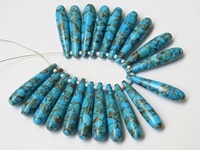 Perle allongée en turquoise cuivrée bleue, 35 mm environ, lisse et polie, trou de 0,50 mm, pierre certifiée par un tiers, pour bijoux