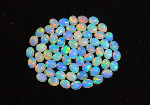 Opale éthiopienne unique en cabochon - Pierre d'opale arc-en-ciel bleu brillant - Forme ovale 6x4mm - Pierre précieuse d'opale à prix de gros - Product Image 5