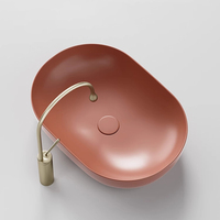 Vasque à poser en céramique rouge de luxe moderne pour projet de salle de bain d'hôtel ou de villa