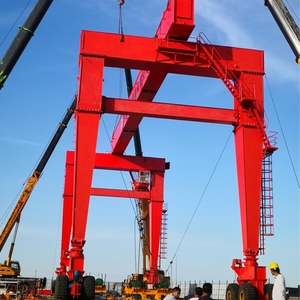 رافعة جسرية مطاطية الإطارات بحمولة 40 طن، 6 طبقات، كابينة عالية متعددة الطوابق تعمل بالمحرك مع تحكم عن بعد، ارتفاع رفع 20 متر لحاويات الموانئ - Product Image 2