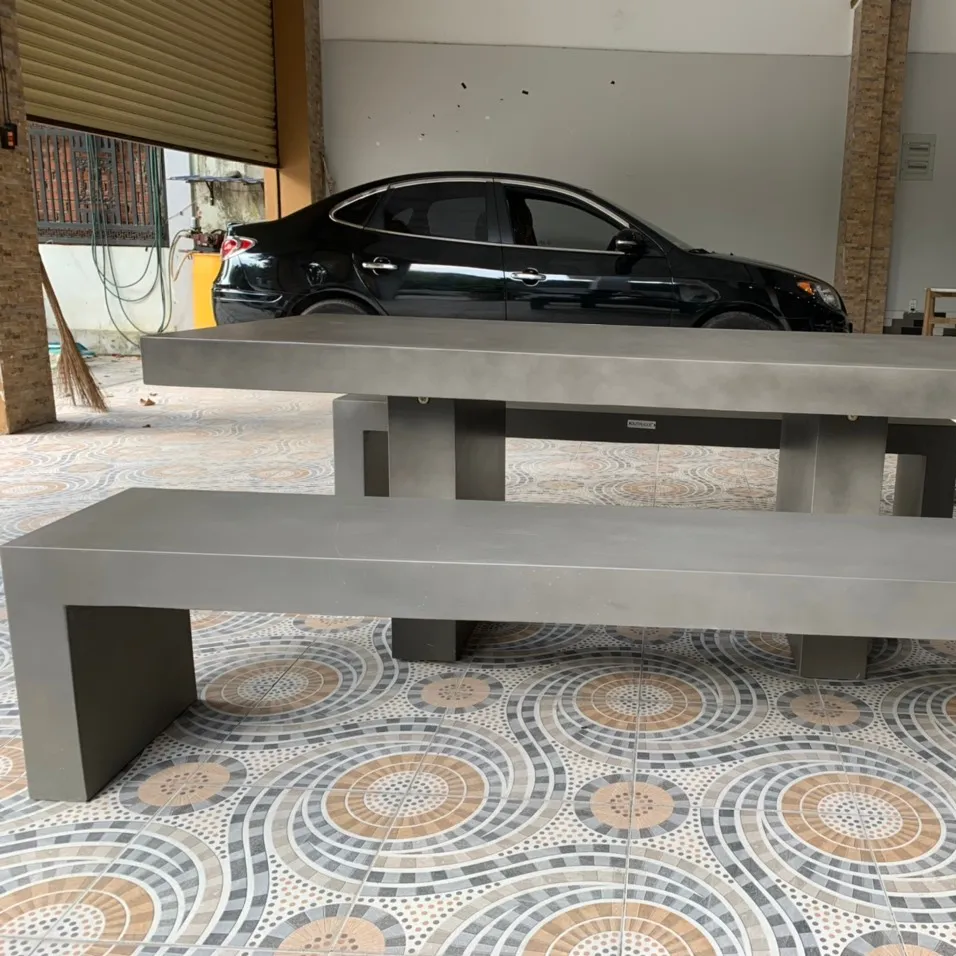 Ensemble table à manger et chaises modernes en métal Mobilier d'extérieur de jardin Siège supérieur Acier Bois léger Banc en béton pour l'extérieur