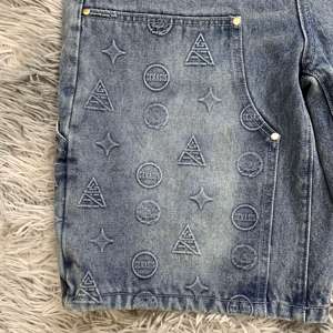 Pantalones cortos de mezclilla rasgados de moda para hombres Pantalones cortos de mezclilla Cremallera vintage 100% Algodón Denim azul claro - Product Image 5