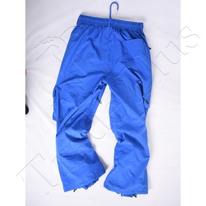 Pantalon de neige bleu d'hiver avec couche intérieure en polyester respirant, cordon de serrage élastique réglable et poches cargo zippées pour le ski - Product Image 4