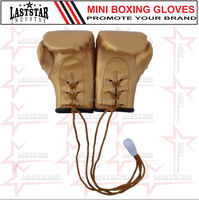 Mini porte-clés en cuir PU en forme de gants de boxe, logo personnalisé, couleur personnalisée, durable, vente en gros, OEM pour la pratique des arts martiaux, adultes