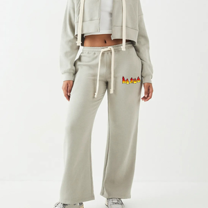 Article tendance : Pantalon de survêtement en polaire pour femme, en polyester et coton, taille élastique, logo imprimé personnalisé, couleur unie, côté - Product Image 1