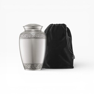 Classic Brushed Silver Metal Keepsake Urn with Floral Engraved Borders and Velvet <b>Storage</b> Bag for Timeless Remembrance - Product Image 1